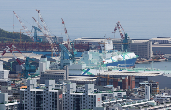 A ship under construction is seen at HD Hyundai Heavy Industries in Dong District, Ulsan, on July 31. [YONHAP]