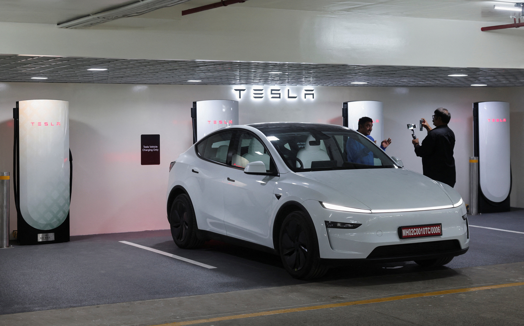A view shows a Tesla Model Y at a charging station in Mumbai, India, August 4, 2025. [REUTERS/YONHAP]